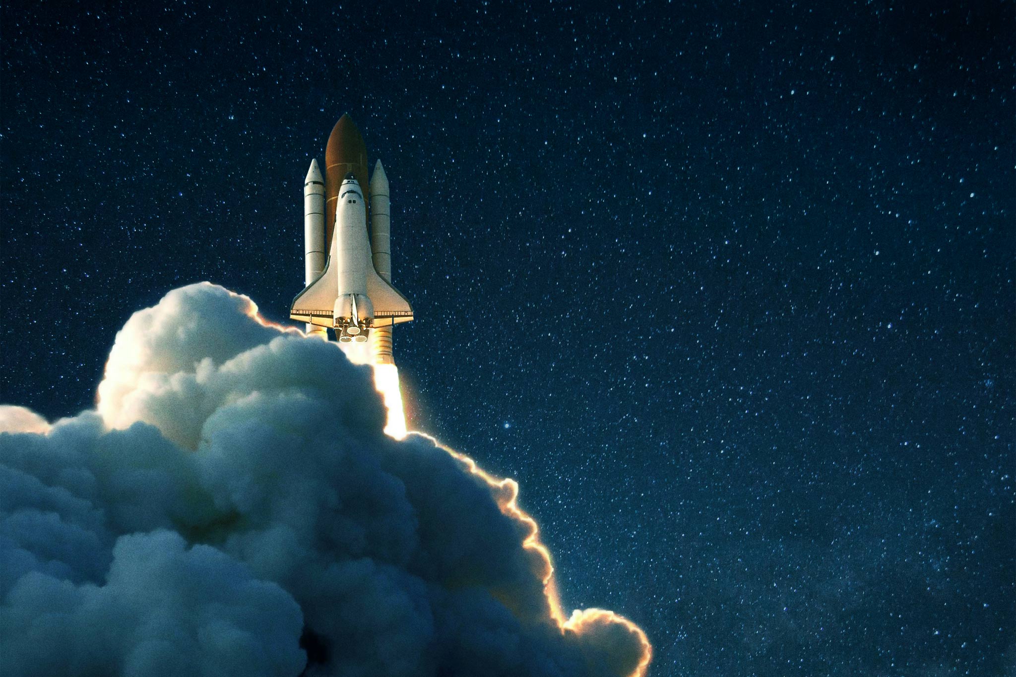 Space rocket launches into space against a starry blue sky. Image: iStock.com/Ales Utovko