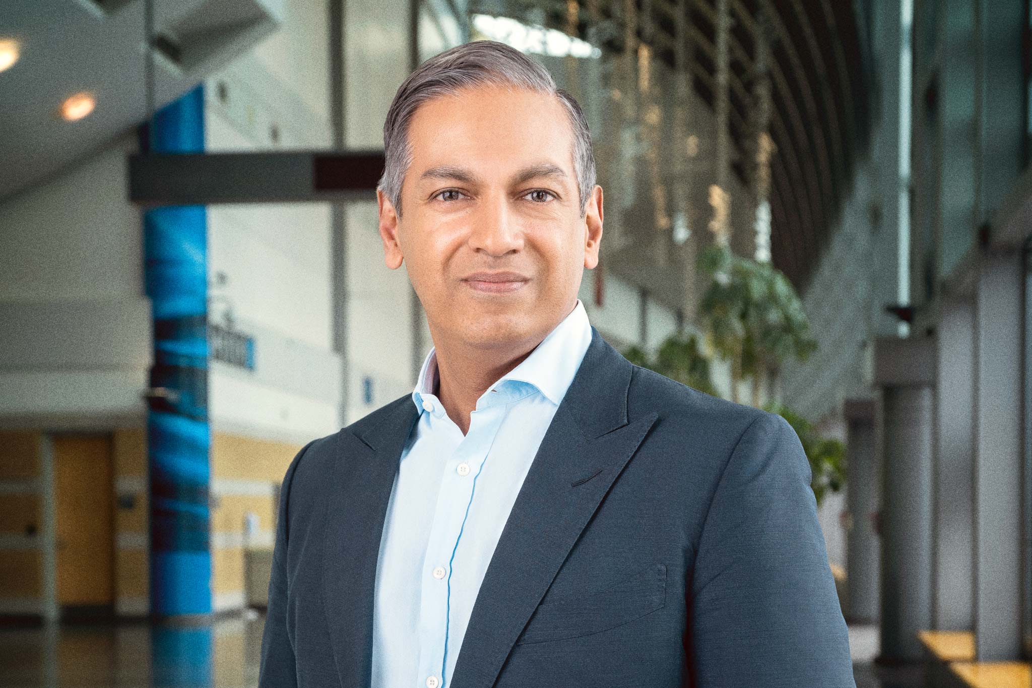 Modern interior portrait of Sherrif Karamat, CAE, President and CEO of PCMA and CEMA.